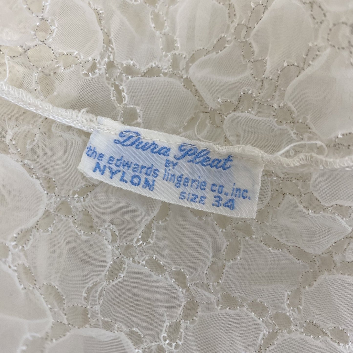 Vintage 1950's Nightgown | Sheer White Nylon Chiffon with Honeycomb Smocking & Crochet Floral Appliqué | Size XS, S | Edwards Lingerie Co. - Daggers & Dames