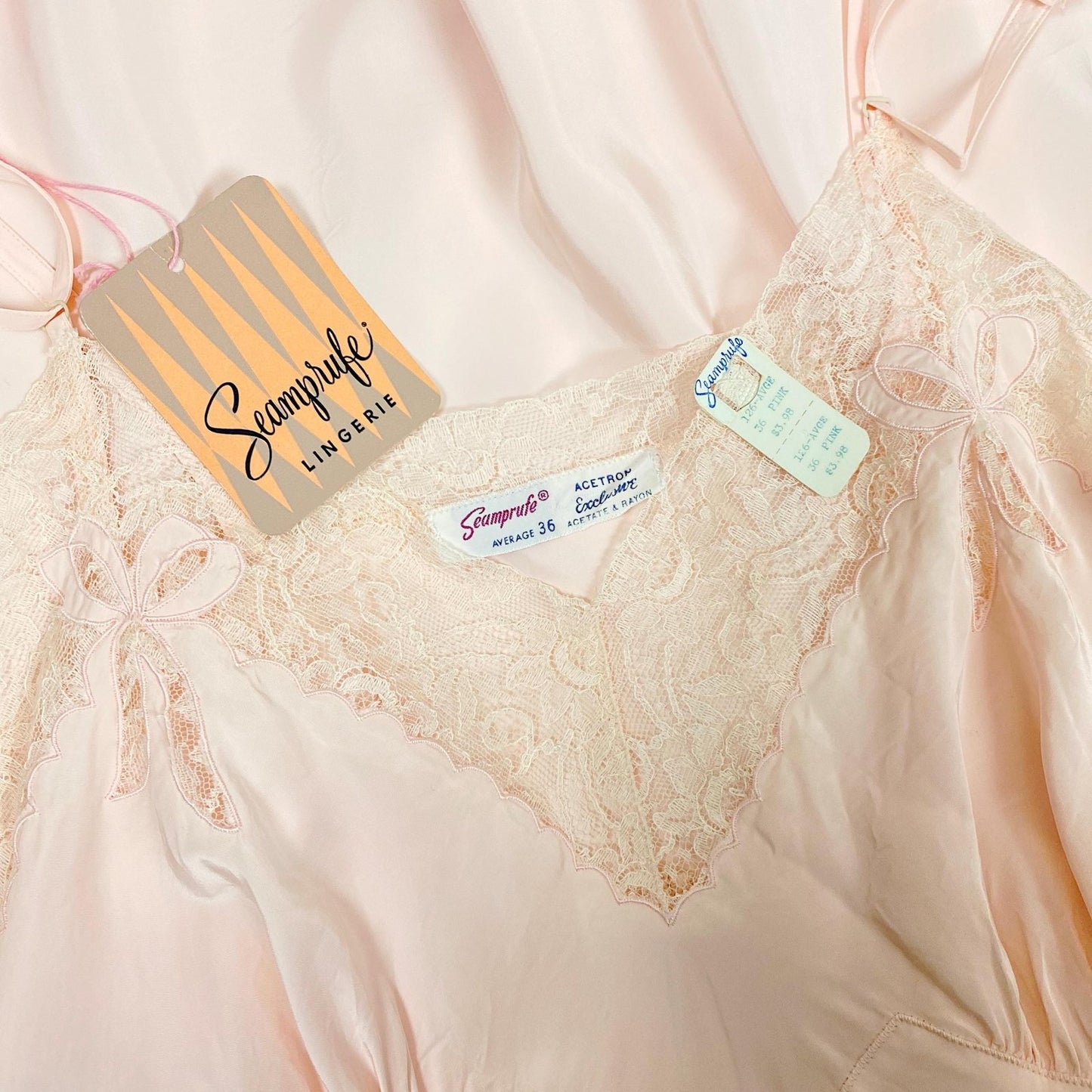 Vintage 1940's - 1950's Slip | Powder Pink Rayon with Bow Appliqués & Lace | Size M | Seamprufe - New with Tags - Daggers & Dames
