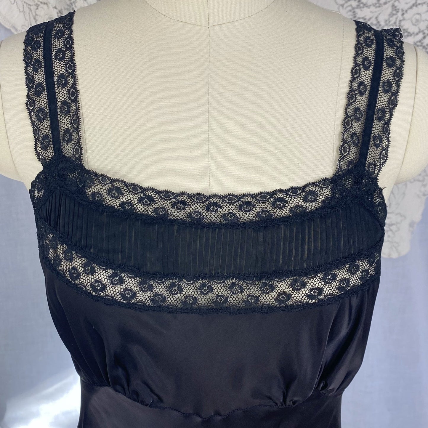 Vintage 1950's Slip | Inky Black Rayon Satin with Crystal Pleated Chiffon Ruffled Hem & Lace | Size XS - Daggers & Dames