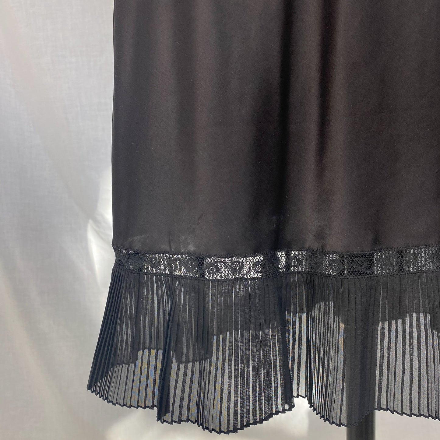 Vintage 1950's Slip | Inky Black Rayon Satin with Crystal Pleated Chiffon Ruffled Hem & Lace | Size XS - Daggers & Dames