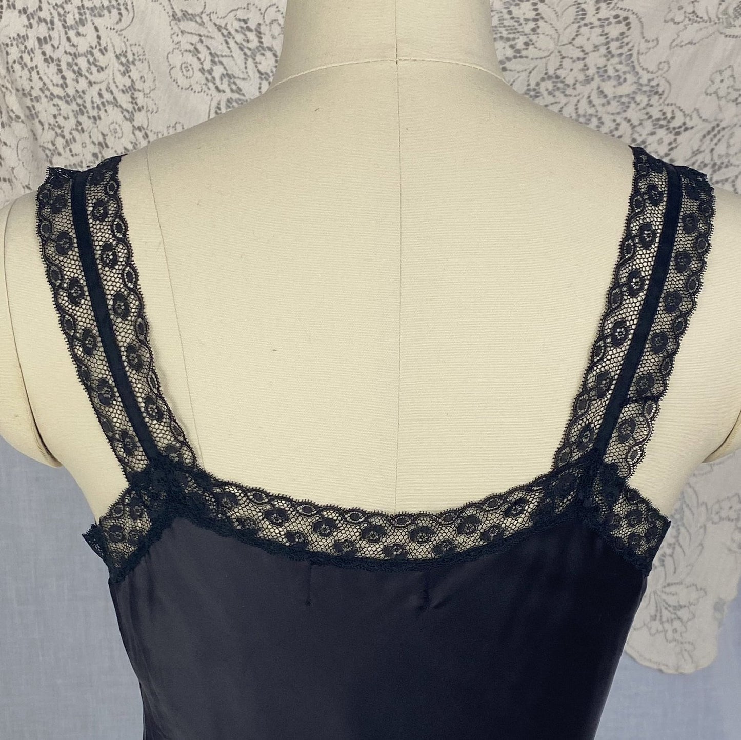 Vintage 1950's Slip | Inky Black Rayon Satin with Crystal Pleated Chiffon Ruffled Hem & Lace | Size XS - Daggers & Dames