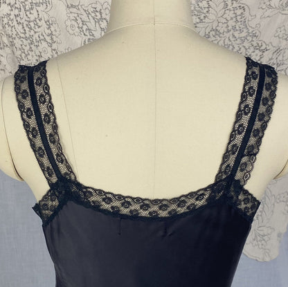 Vintage 1950's Slip | Inky Black Rayon Satin with Crystal Pleated Chiffon Ruffled Hem & Lace | Size XS - Daggers & Dames
